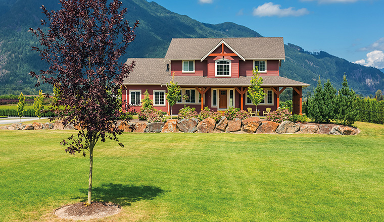 rural log home 760x440 Rural log home with mountain in back